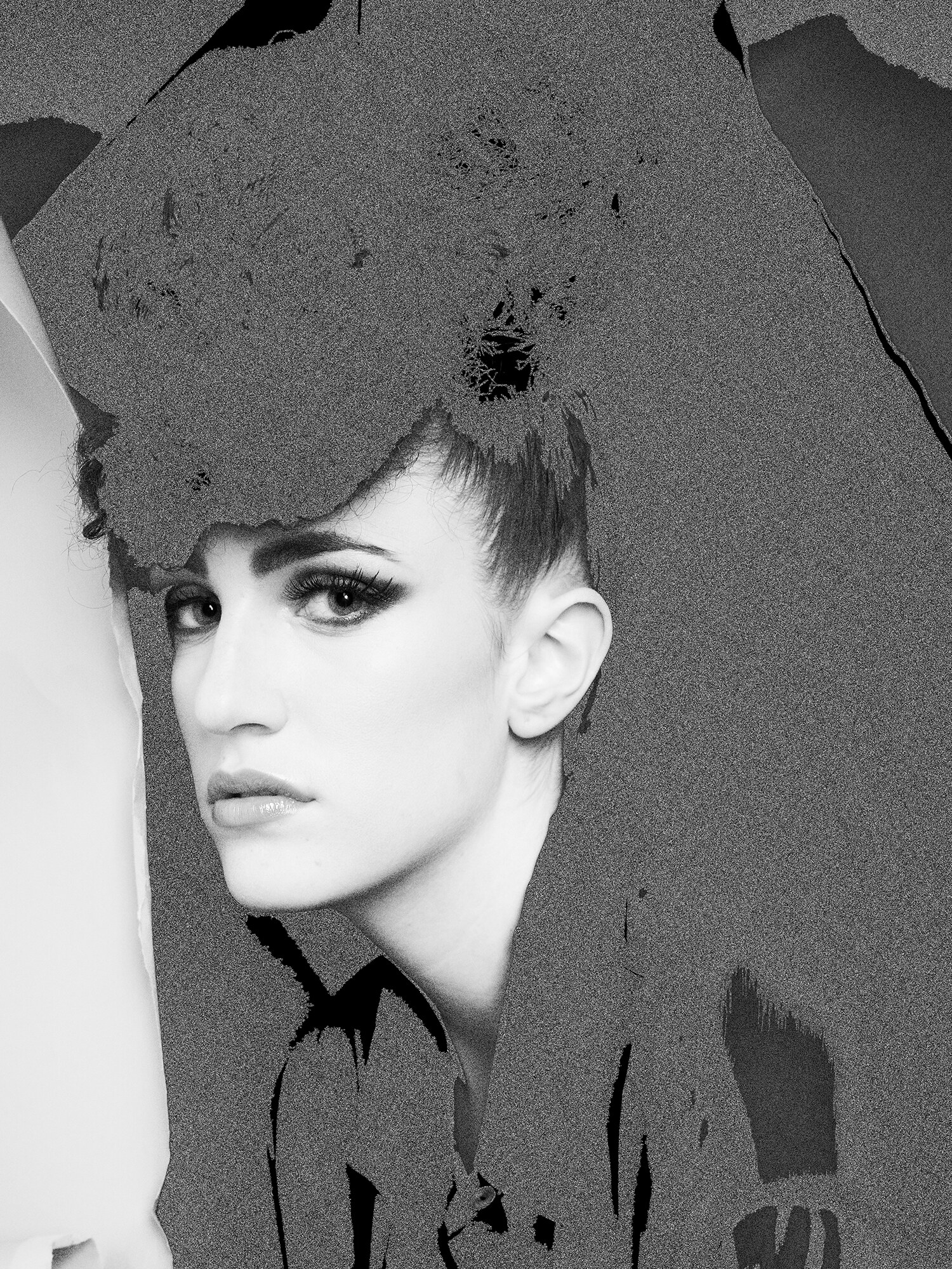Avant-garde black and white beauty portrait with bold makeup and abstract textured overlay, fashion meets fine art. Beauty photography by Jason Guffy.