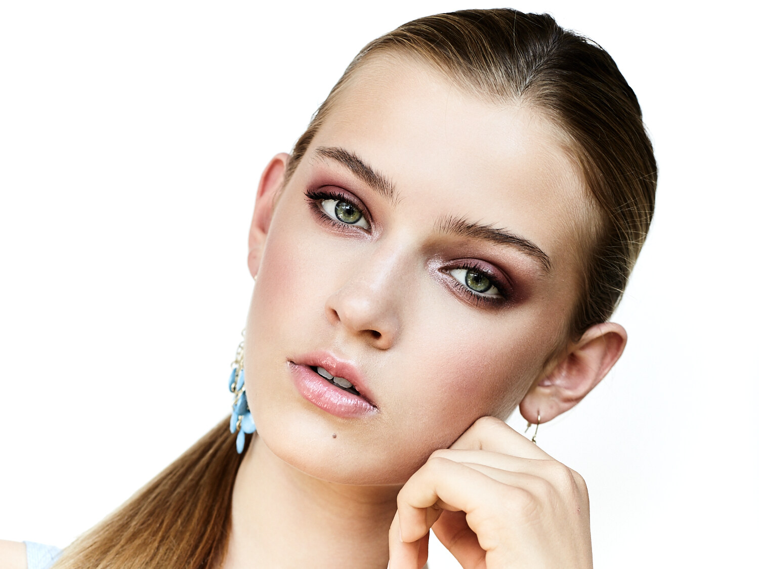 Studio beauty close-up, natural glow in soft studio light. Beauty photography by Jason Guffy.