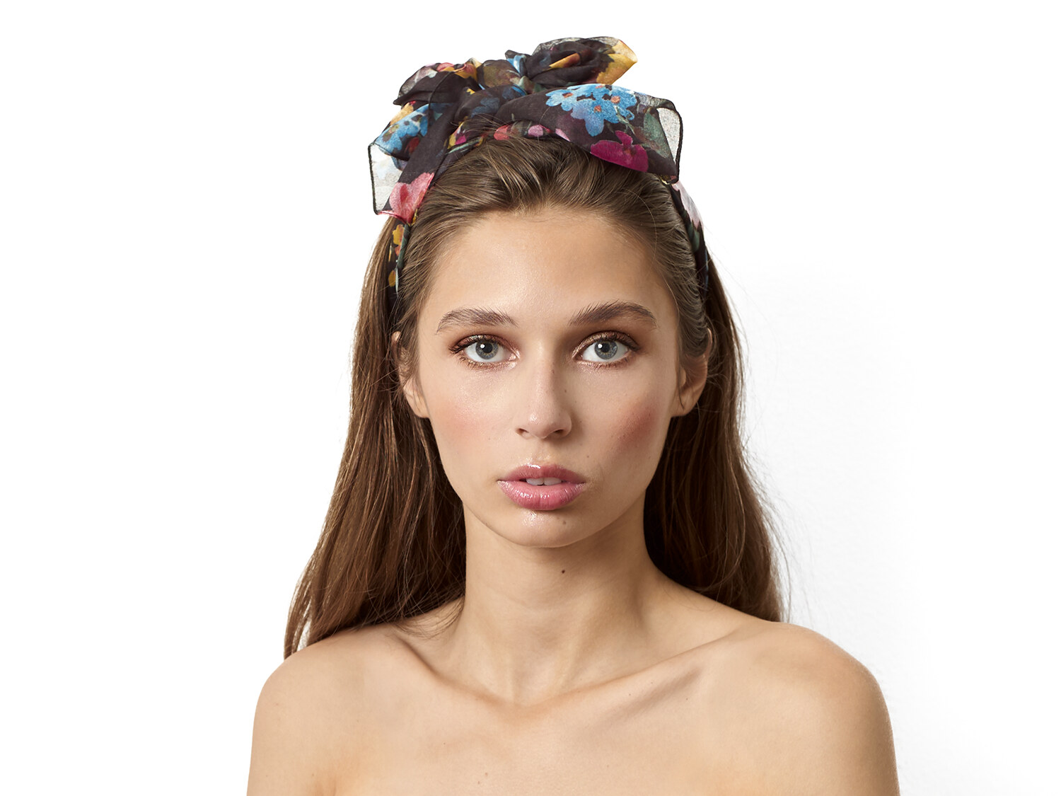 Studio beauty portrait with natural styling and soft studio lighting. Beauty photography by Jason Guffy.
