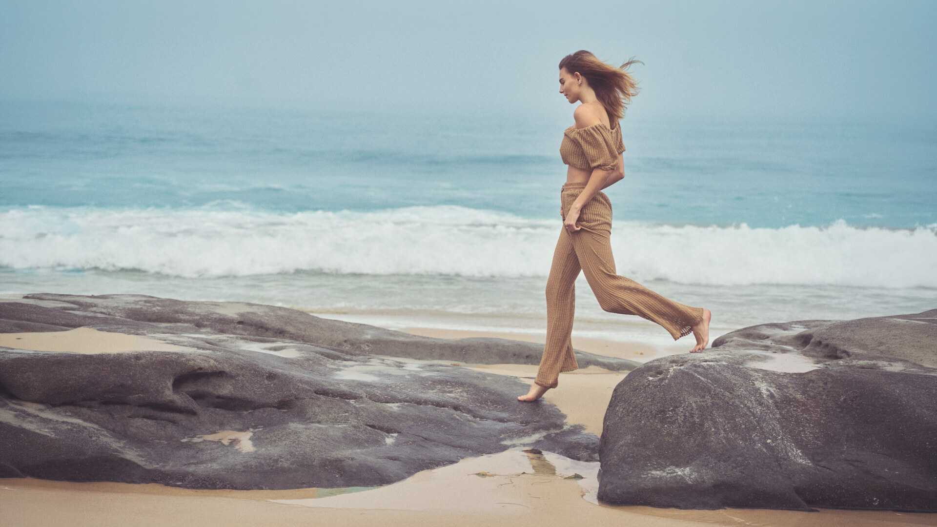 Coastal fashion editorial on the Southern California coast in soft natural light. Jason Guffy Photography.