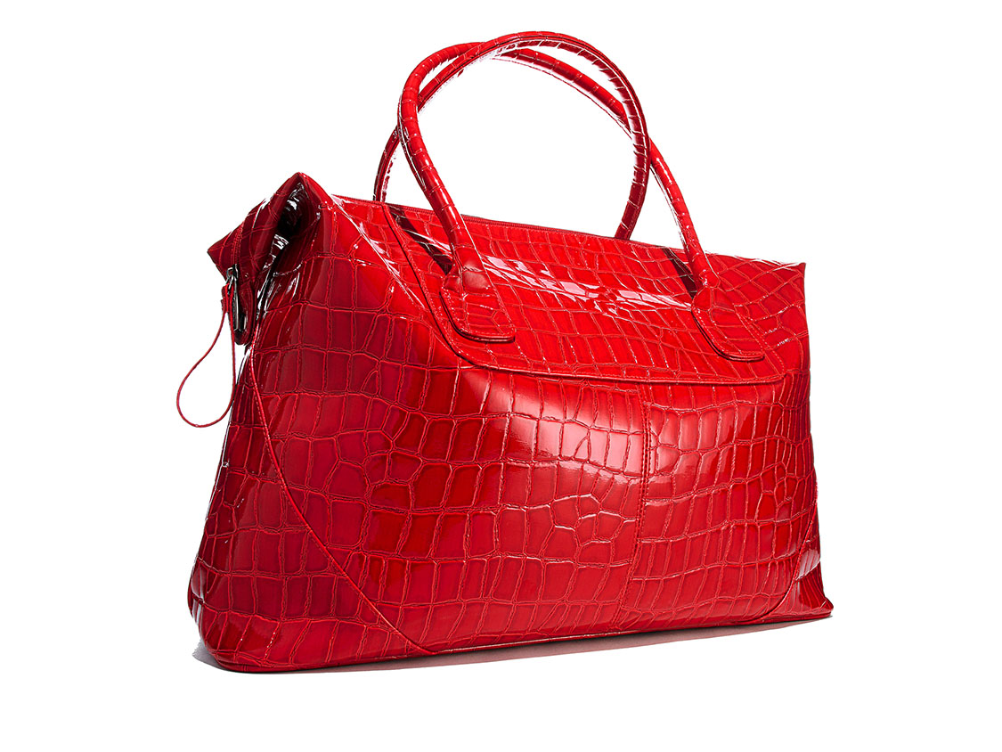 Designer handbag e-commerce product photography on a white background. On-white e-commerce product photography.