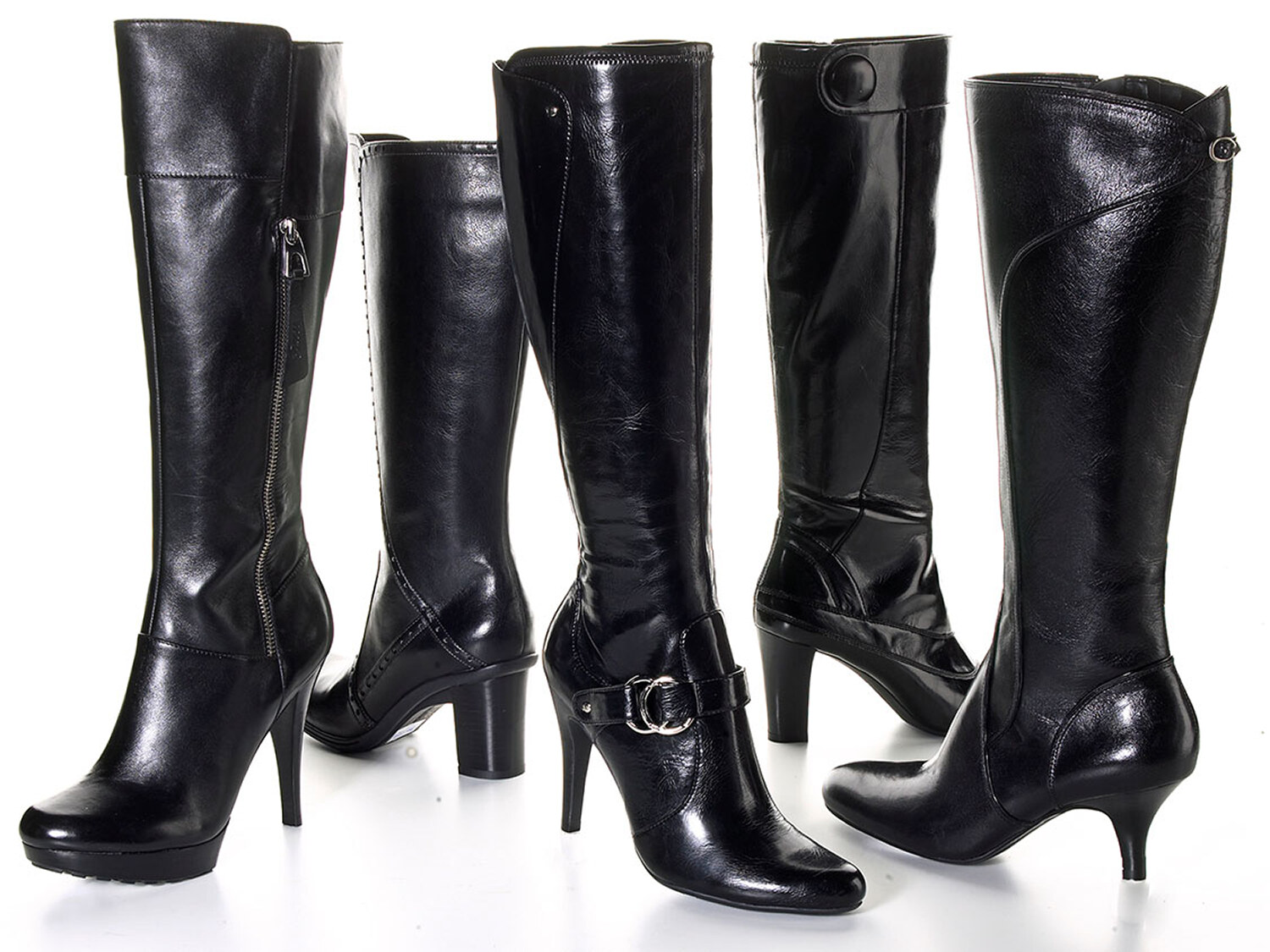 Women's black leather boots on a clean white background, footwear e-commerce. Product photography by Jason Guffy.