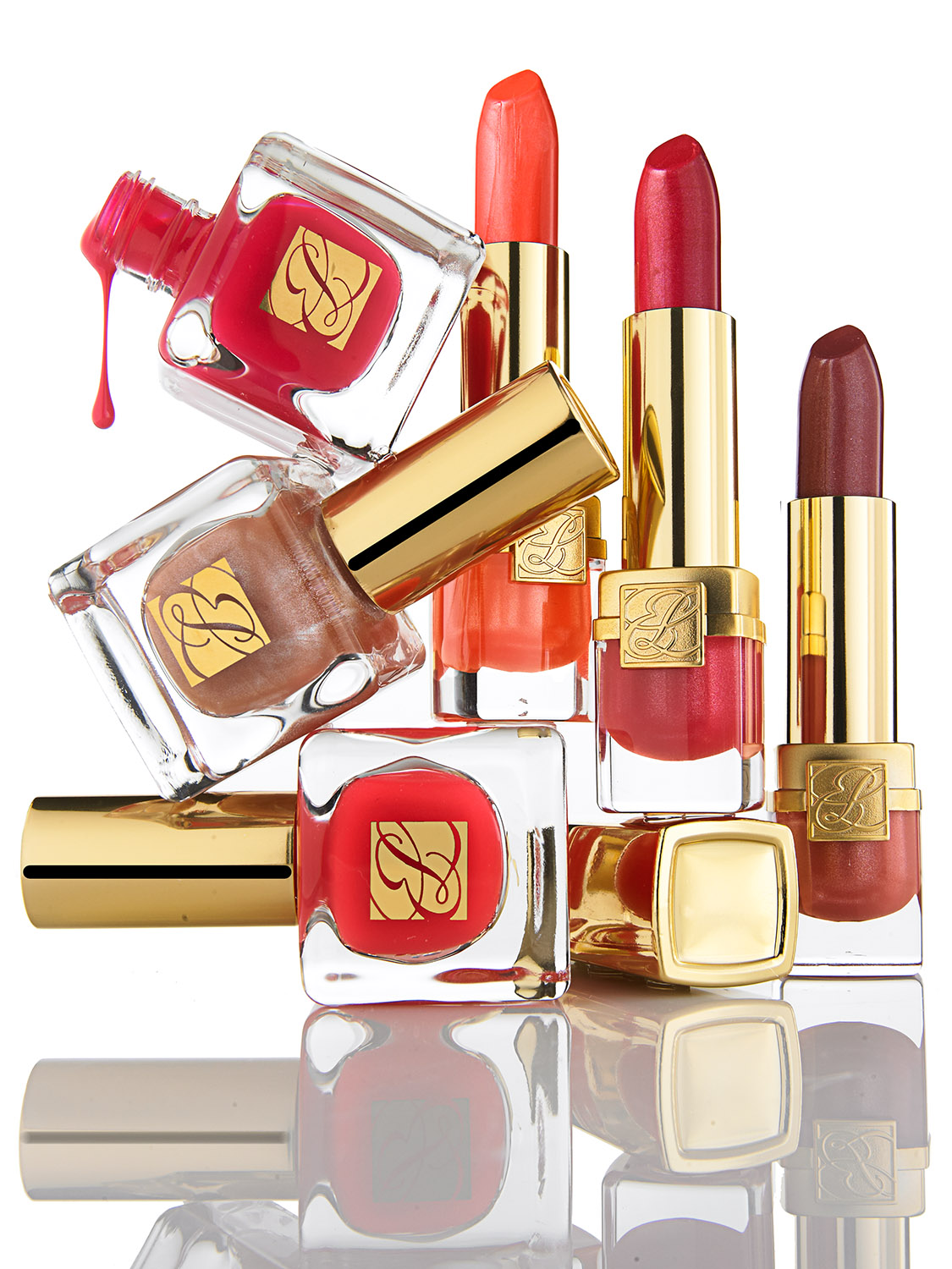 Estée Lauder nail polish and lipstick beauty product photography for luxury cosmetics advertising. Jason Guffy commercial photographer, San Diego.