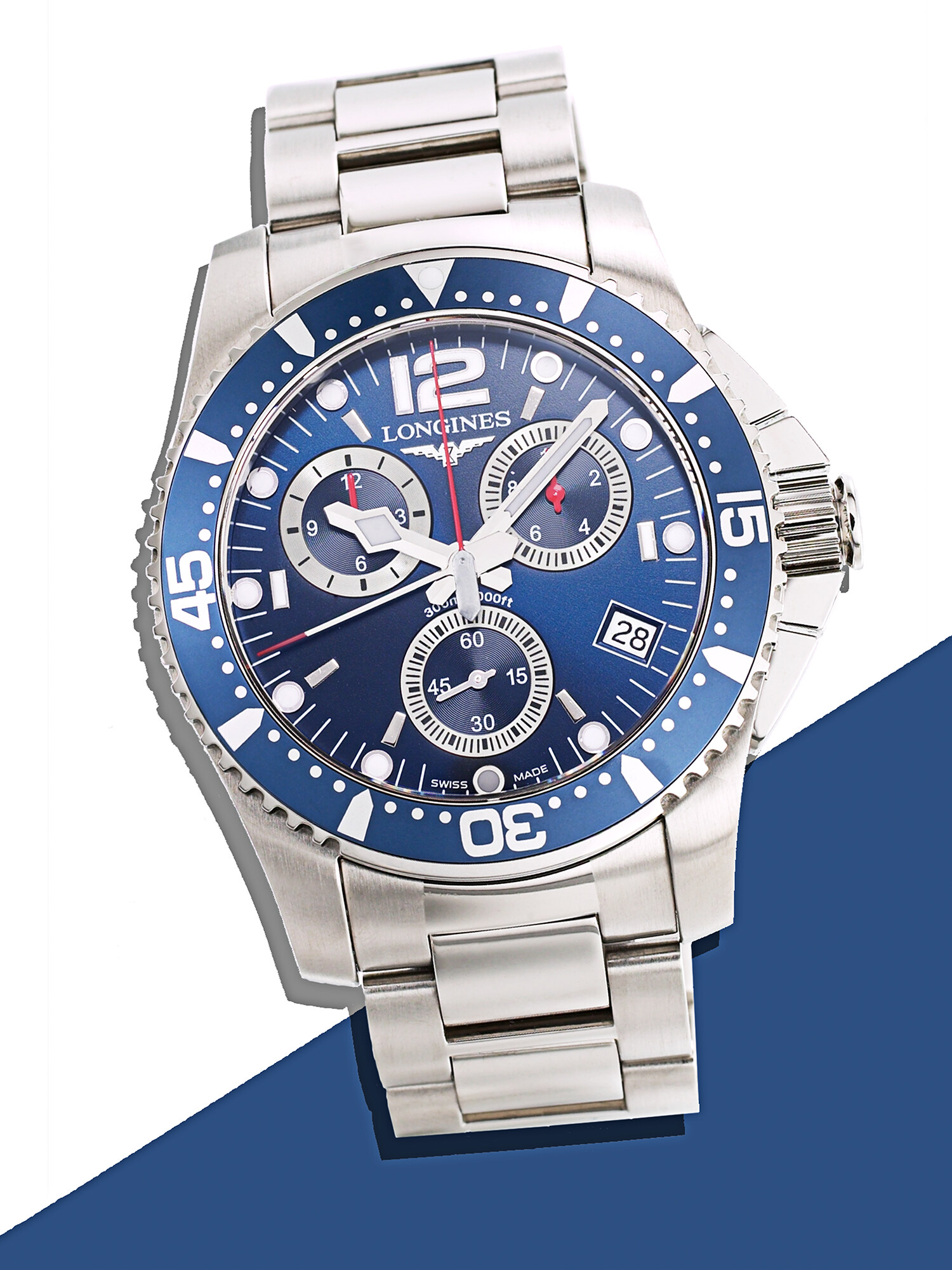 Longines watch with blue dial and steel bezel, precision watch product photography for advertising. Jason Guffy Photography.