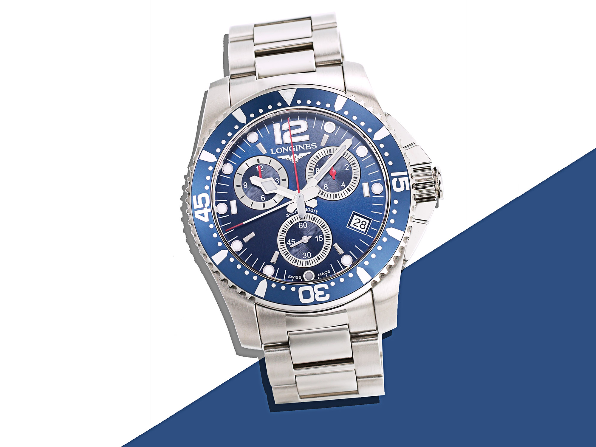 Longines watch with blue dial and steel bezel, precision watch product photography for advertising. Jason Guffy Photography.